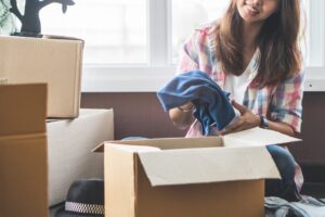 Packing clothes for moving